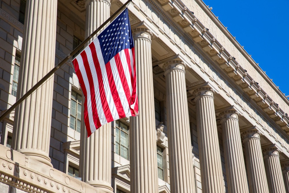 NCUA Headquarters with an American flag outside the building